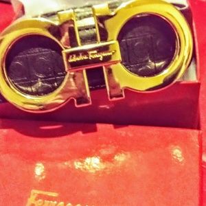 Black ferraggamo belt with gold buckle